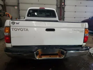 2002 Toyota Tacoma with VIN 5TEVL52N52Z132628, listed as a Copart auction lot 44796245 with 209,480 mi miles and Salvage title. Bid and sale history available at DreamBid. Image 6.