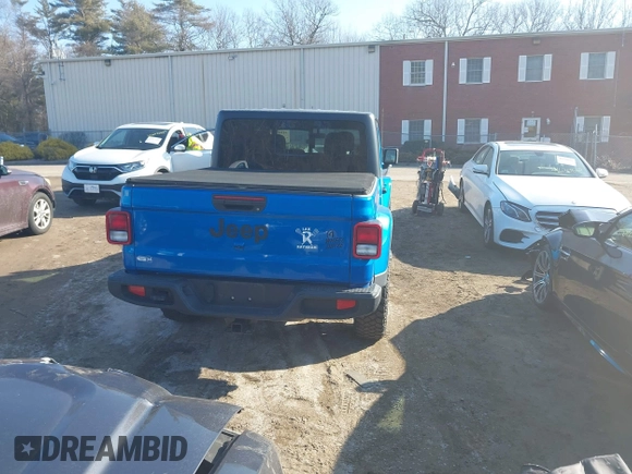 2021 Jeep Gladiator Willys with VIN 1C6HJTAG3ML572690, listed as a IAAI auction lot 41649907 with 74,734 mi miles and . Bid and sale history available at DreamBid. Image 17.