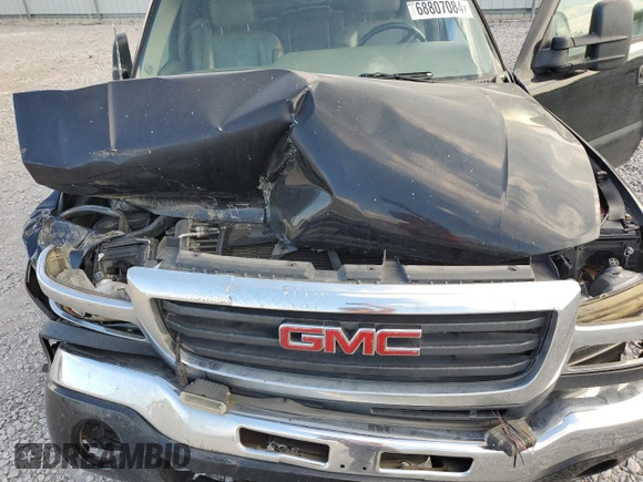 2006 GMC Sierra 3500 DRW SL z VIN 1GTHK33236F115273, wystawiony jako Copart lot #68807084 z przebiegiem 249 002 mil mil oraz Szkody całkowita. Historia ofert i sprzedaży dostępna na DreamBid. Obrazek 13.