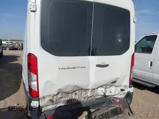 2020 Ford Transit Cargo with VIN 1FTBR1C81LKB10957, listed as a IAAI auction lot 41830210 with 86,006 mi miles and . Bid and sale history available at DreamBid. Image 6.