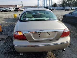 2005 Jaguar S-Type with VIN SAJWA01T55FN14254, listed as a Copart auction lot 86994974 with 126,484 mi miles and Salvage Title. Bid and sale history available at DreamBid. Image 6.