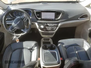 2023 Chrysler Pacifica Hybrid Touring L with VIN 2C4RC1L79PR608659, listed as a Copart auction lot 56945365 with 45,697 mi miles and Salvage title. Bid and sale history available at DreamBid. Image 8.