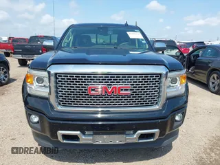 2015 GMC Sierra 1500 Denali z VIN 3GTU2WEJ9FG386812, wystawiony jako IAAI lot #42381651 z przebiegiem 138 009 mil mil oraz . Historia ofert i sprzedaży dostępna na DreamBid. Obrazek 12.