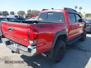 2018 Toyota Tacoma SR5 with VIN 3TMAZ5CN2JM067292, listed as a IAAI auction lot 41851959 with 70,988 mi miles and . Bid and sale history available at DreamBid. Image 4.