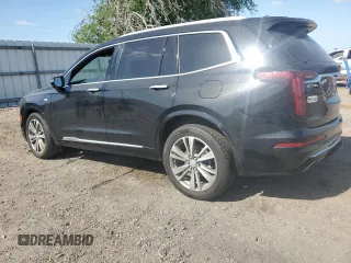 2021 Cadillac XT6 Premium Luxury with VIN 1GYKPCRS4MZ199110, listed as a Copart auction lot 51798905 with 66,486 mi miles and Salvage Title. Bid and sale history available at DreamBid. Image 2.