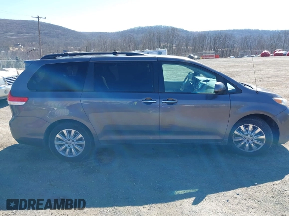 2013 Toyota Sienna XLE with VIN 5TDDK3DC6DS067612, listed as a IAAI auction lot 41756287 with 142,707 mi miles and . Bid and sale history available at DreamBid. Image 13.