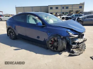 2023 Tesla Model Y Performance with VIN 7SAYGDEF5PF917808, listed as a Copart auction lot 48348615 with Not Provided miles and Salvage Title. Bid and sale history available at DreamBid. Image 4.