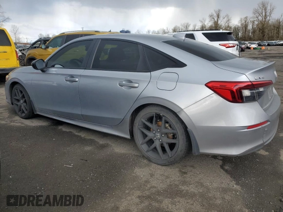 2022 Honda Civic Sport with VIN 2HGFE2F52NH530551, listed as a Copart auction lot 46464455 with 71,564 mi miles and Salvage Title. Bid and sale history available at carsss.com. Image 2.