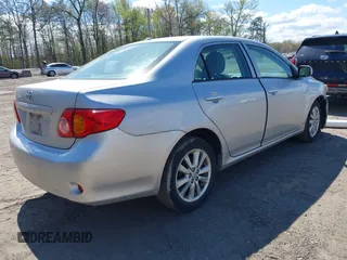 2009 Toyota Corolla with VIN 2T1BU40E69C142856, listed as a IAAI auction lot 42045414 with 238,154 mi miles. Bid and sale history available at carsss.com. Image 4.