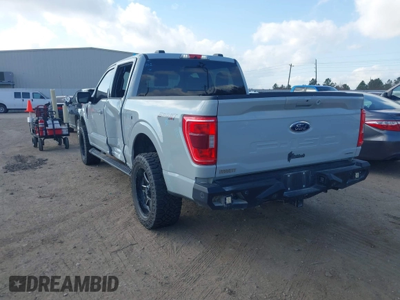 2023 Ford F-150 XL with VIN 1FTFW1E84PFA28761, listed as a IAAI auction lot 41532863 with 32,929 mi miles. Bid and sale history available at carsss.com. Image 3.
