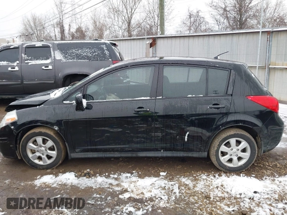 2009 Nissan Versa 1.8 SL with VIN 3N1BC13E49L427102, listed as a IAAI auction lot 41553357 with 133,300 mi miles. Bid and sale history available at carsss.com. Image 14.