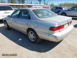 2000 Toyota Camry CE with VIN JT2BG22K6Y0451632, listed as a IAAI auction lot 42030842 with 200,734 mi miles. Bid and sale history available at carsss.com. Image 3.