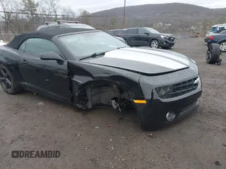 2013 Chevrolet Camaro LT z VIN 2G1FC3D32D9205069, wystawiony jako IAAI lot #41931863 z przebiegiem 75 244 mil mil oraz . Historia ofert i sprzedaży dostępna na DreamBid. Obrazek 6.