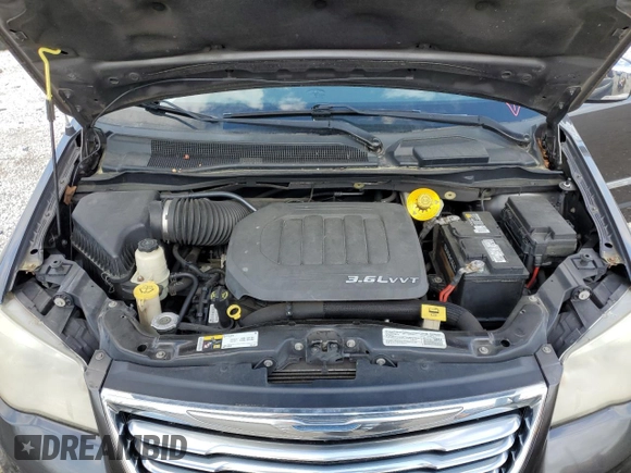 2014 Chrysler Town & Country Touring L 30th Anniversary with VIN 2C4RC1CG4ER310999, listed as a Copart auction lot 53379475 with 139,857 mi miles and Salvage Title. Bid and sale history available at DreamBid. Image 12.