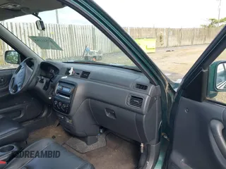 2000 Honda CR-V SE z VIN JHLRD1871YS010154, wystawiony jako IAAI lot #42541188 z przebiegiem 137 501 mil mil oraz . Historia ofert i sprzedaży dostępna na DreamBid. Obrazek 5.