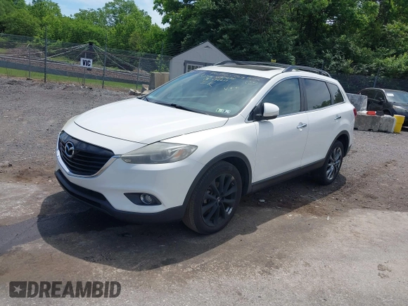 2014 Mazda CX-9 Grand Touring z VIN JM3TB3DV0E0436649, wystawiony jako IAAI lot #42319638 z przebiegiem 128 421 mil mil oraz . Historia ofert i sprzedaży dostępna na DreamBid. Obrazek 17.