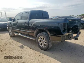 2016 Nissan Titan Platinum Reserve with VIN 1N6BA1F42GN506140, listed as a Copart auction lot 57171395 with 141,295 mi miles and Salvage title. Bid and sale history available at DreamBid. Image 2.