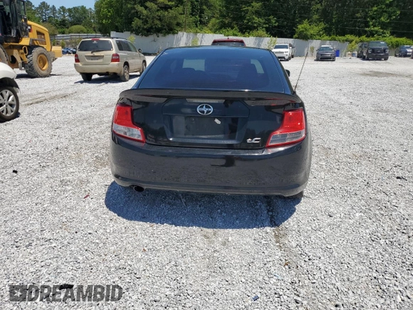 2012 Scion tC z VIN JTKJF5C72C3044845, wystawiony jako Copart lot #57863765 z przebiegiem 220 967 mil mil oraz Szkoda całkowita • Salvage title. Historia ofert i sprzedaży dostępna na DreamBid. Obrazek 6.