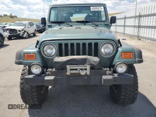 2000 Jeep Wrangler Sport с VIN 1J4FA49S4YP710633, выставлен на аукционе Copart как лот 65095875 с пробегом 107 613 миль миль и Чистый • Clean title. История ставок и продаж доступна на DreamBid. Изображение 5.