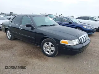 2011 Ford Crown Victoria LX z VIN 2FABP7EV0BX147267, wystawiony jako IAAI lot #42052728 z przebiegiem 177 034 mil mil oraz . Historia ofert i sprzedaży dostępna na DreamBid. Obrazek 1.