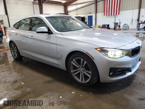 2018 BMW 3 Series 330i xDrive with VIN WBA8Z9C52JG828741, listed as a Copart auction lot 61457015 with 87,064 mi miles and Salvage title. Bid and sale history available at DreamBid. Image 4.