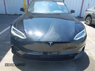 2021 Tesla Model S Long Range z VIN 5YJSA1E54MF429360, wystawiony jako IAAI lot #42662440 z przebiegiem 36 395 mil mil oraz . Historia ofert i sprzedaży dostępna na DreamBid. Obrazek 12.