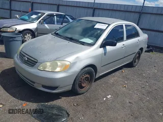 2004 Toyota Corolla CE with VIN 1NXBR32E74Z191130, listed as a IAAI auction lot 42036619 with 211,884 mi miles and . Bid and sale history available at DreamBid. Image 2.