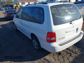 2005 Kia Sedona LX with VIN KNDUP132756764528, listed as a IAAI auction lot 41709414 with 999,999 mi miles. Bid and sale history available at carsss.com. Image 3.
