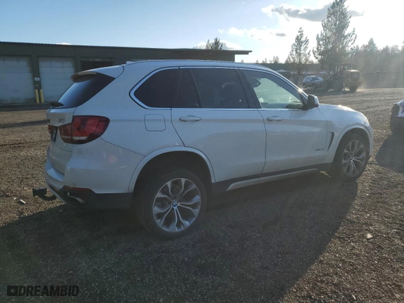 2017 BMW X5 xDrive40e iPerformance with VIN 5UXKT0C50H0S79726, listed as a Copart auction lot 48129805 with 64,853 mi miles and Salvage Title. Bid and sale history available at carsss.com. Image 3.