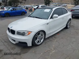 2013 BMW 1 Series 135i with VIN WBAUC9C54DVY60154, listed as a IAAI auction lot 42354743 with 159,571 mi miles and . Bid and sale history available at DreamBid. Image 2.