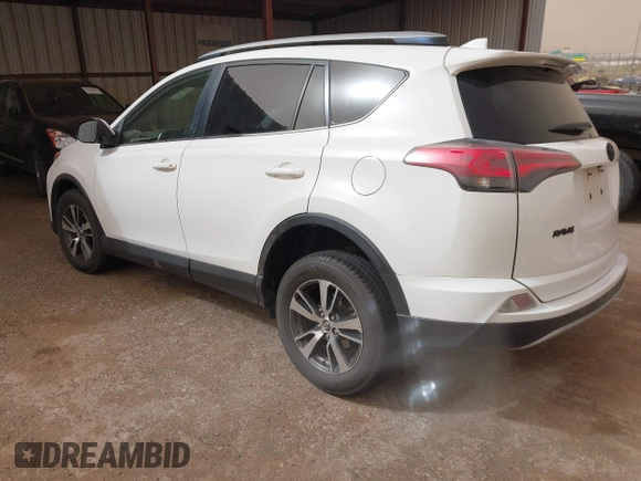 2018 Toyota RAV4 XLE with VIN JTMWFREV2JJ730568, listed as a IAAI auction lot 41814302 with 108,622 mi miles and . Bid and sale history available at DreamBid. Image 3.