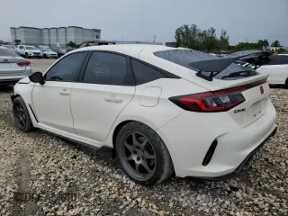 2023 Honda Civic Type R z VIN JHMFL5G48PX002084, wystawiony jako Copart lot #62284134 z przebiegiem 8 604 mil mil oraz Szkoda całkowita • Salvage title. Historia ofert i sprzedaży dostępna na DreamBid. Obrazek 2.