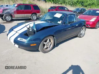 1996 Mazda MX-5 Miata z VIN JM1NA3533T0716564, wystawiony jako IAAI lot #42191052 z przebiegiem 101 713 mil mil oraz . Historia ofert i sprzedaży dostępna na DreamBid. Obrazek 2.