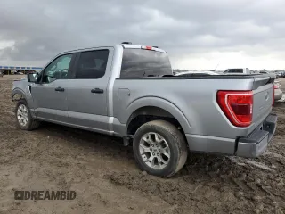 2023 Ford F-150 XL with VIN 1FTEW1C85PKD62576, listed as a Copart auction lot 44970775 with 52,070 mi miles and Salvage title. Bid and sale history available at DreamBid. Image 2.