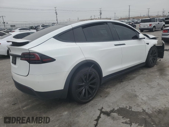 2023 Tesla Model X with VIN 7SAXCBE53PF380665, listed as a Copart auction lot 50799755 with Not Provided miles and Salvage Title. Bid and sale history available at DreamBid. Image 3.