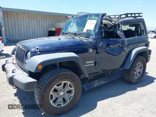 2013 Jeep Wrangler Sport with VIN 1C4AJWAG3DL627179, listed as a IAAI auction lot 42262246 with 33,536 mi miles and . Bid and sale history available at DreamBid. Image 2.
