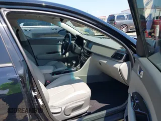 2017 Kia Optima EX with VIN 5XXGU4L36HG123828, listed as a IAAI auction lot 42059856 with 123,305 mi miles and . Bid and sale history available at DreamBid. Image 5.