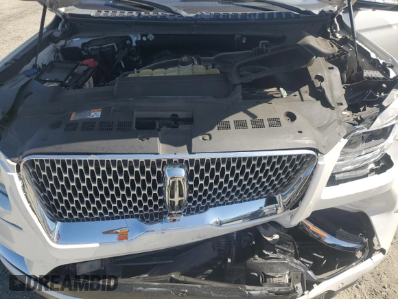 2019 Lincoln Navigator Reserve with VIN 5LMJJ2LT1KEL19974, listed as a Copart auction lot 62643925 with 64,030 mi miles and Salvage title. Bid and sale history available at DreamBid. Image 12.