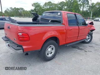 2002 Ford F-150 XLT with VIN 1FTRW07L62KC34432, listed as a IAAI auction lot 41816271 with 263,813 mi miles and . Bid and sale history available at DreamBid. Image 4.