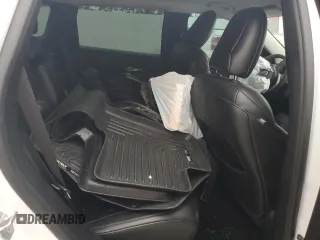 2020 Jeep Cherokee Latitude Plus z VIN 1C4PJLLBXLD552595, wystawiony jako Copart lot #48961565 z przebiegiem 56 801 mil mil oraz Szkoda całkowita • Salvage title. Historia ofert i sprzedaży dostępna na DreamBid. Obrazek 11.