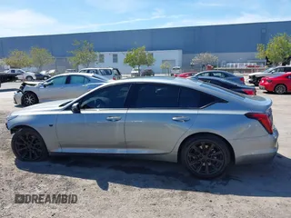 2023 Cadillac CT5 Luxury z VIN 1G6DW5RK7P0146345, wystawiony jako IAAI lot #41862152 z przebiegiem 18 902 mil mil oraz . Historia ofert i sprzedaży dostępna na DreamBid. Obrazek 15.