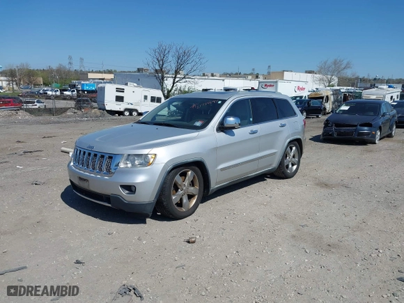 2011 Jeep Grand Cherokee Overland with VIN 1J4RR6GT6BC568491, listed as a IAAI auction lot 42035464 with 147,389 mi miles. Bid and sale history available at carsss.com. Image 17.