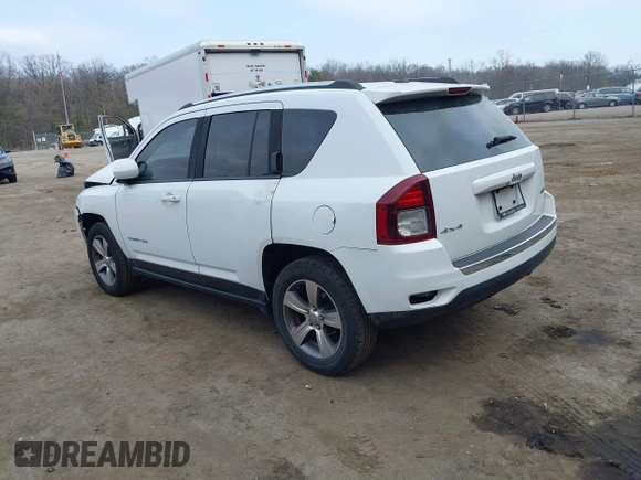 2016 Jeep Compass Latitude with VIN 1C4NJDEBXGD737018, listed as a IAAI auction lot 41800071 with 158,006 mi miles. Bid and sale history available at carsss.com. Image 3.