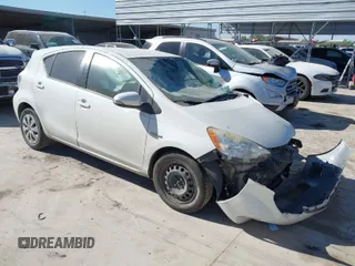 2014 Toyota Prius One with VIN JTDKDTB32E1069313, listed as a IAAI auction lot 41848910 with 287,698 mi miles and . Bid and sale history available at DreamBid. Image 1.