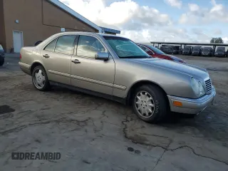 1998 Mercedes-Benz E-Class with VIN WDBJF65F4WA499776, listed as a Copart auction lot 78259644 with 237,912 mi miles and Salvage Title. Bid and sale history available at carsss.com. Image 4.