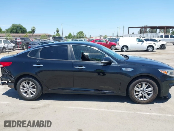 2017 Kia Optima LX z VIN 5XXGT4L39HG126838, wystawiony jako IAAI lot #42487934 z przebiegiem 108 905 mil mil oraz . Historia ofert i sprzedaży dostępna na DreamBid. Obrazek 14.