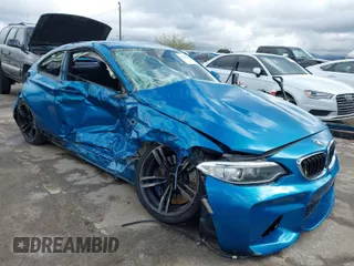 2017 BMW M2 with VIN WBS1H9C53HV887089, listed as a IAAI auction lot 41731841 with 57,509 mi miles. Bid and sale history available at carsss.com. Image 1.