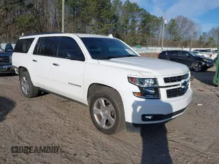 2019 Chevrolet Suburban LT with VIN 1GNSCHKC9KR299502, listed as a IAAI auction lot 41687079 with 117,278 mi miles and . Bid and sale history available at DreamBid. Image 1.