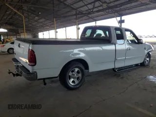 2003 Ford F-150 XL with VIN 1FTRX17L13NB49209, listed as a Copart auction lot 44453395 with 145,262 mi miles and Salvage Title. Bid and sale history available at carsss.com. Image 3.