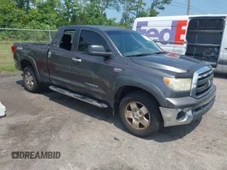 2011 Toyota Tundra with VIN 5TFRY5F13BX103582, listed as a IAAI auction lot 42811481 with 335,354 mi miles and . Bid and sale history available at DreamBid. Image 1.